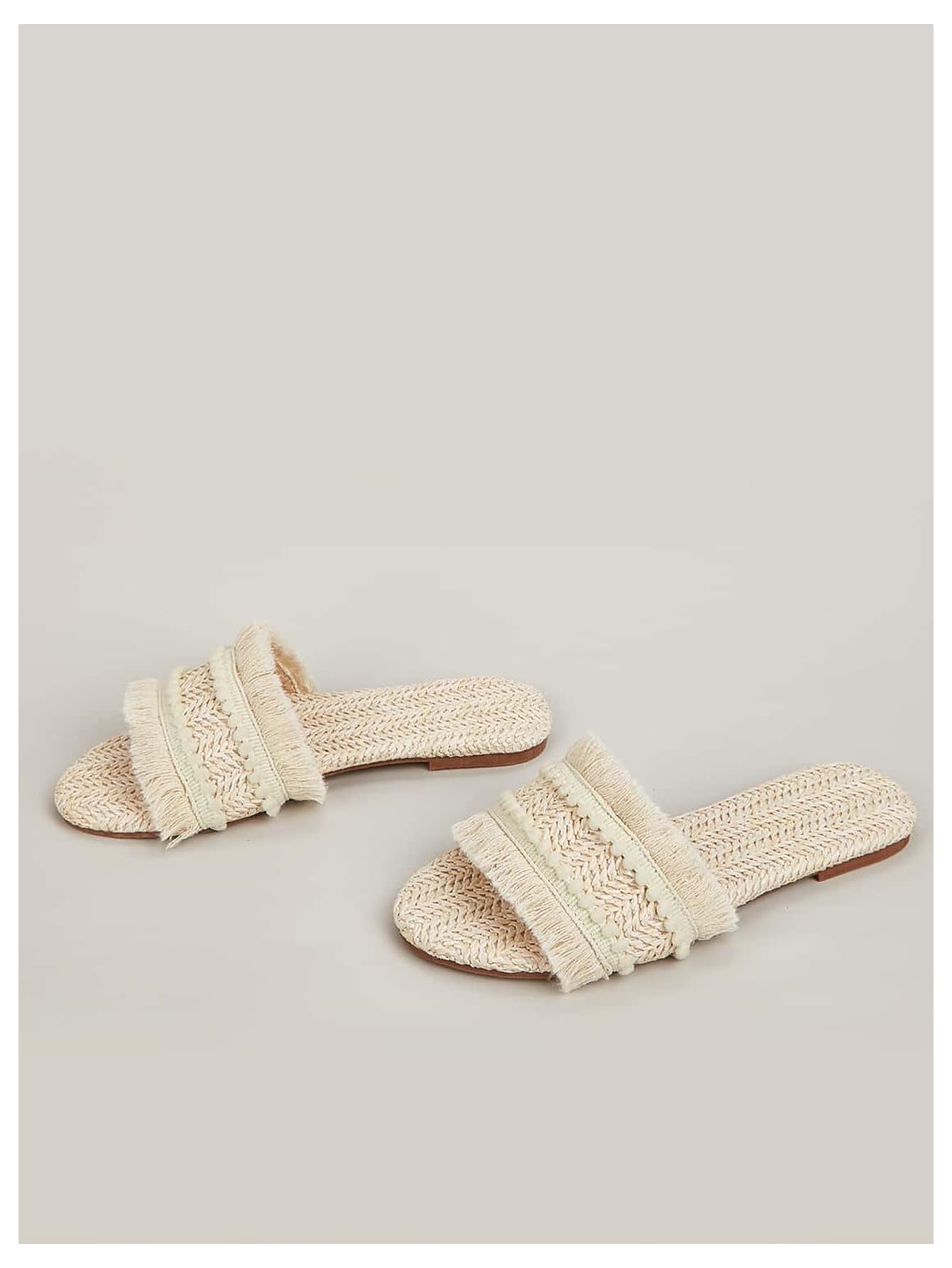OYOANGLE Women's Fringe Straw Sandals Crochet Open Toe Single Band Flat Slip On Sandals Beige 7
