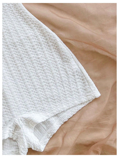 WDIRARA Women's Strapless Twist Front Tube Romper Textured Sleeveless Shorts Jumpsuits White Small