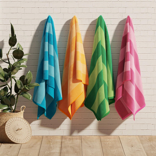 Great Bay Home 100% Cotton Velour Oversized 4 Pack Beach Towels 35" x 70" - Cabana Pool Towels - Quick Dry, Large Swim Towels for Adults and Kids (Orange, Pink, Blue, Green).