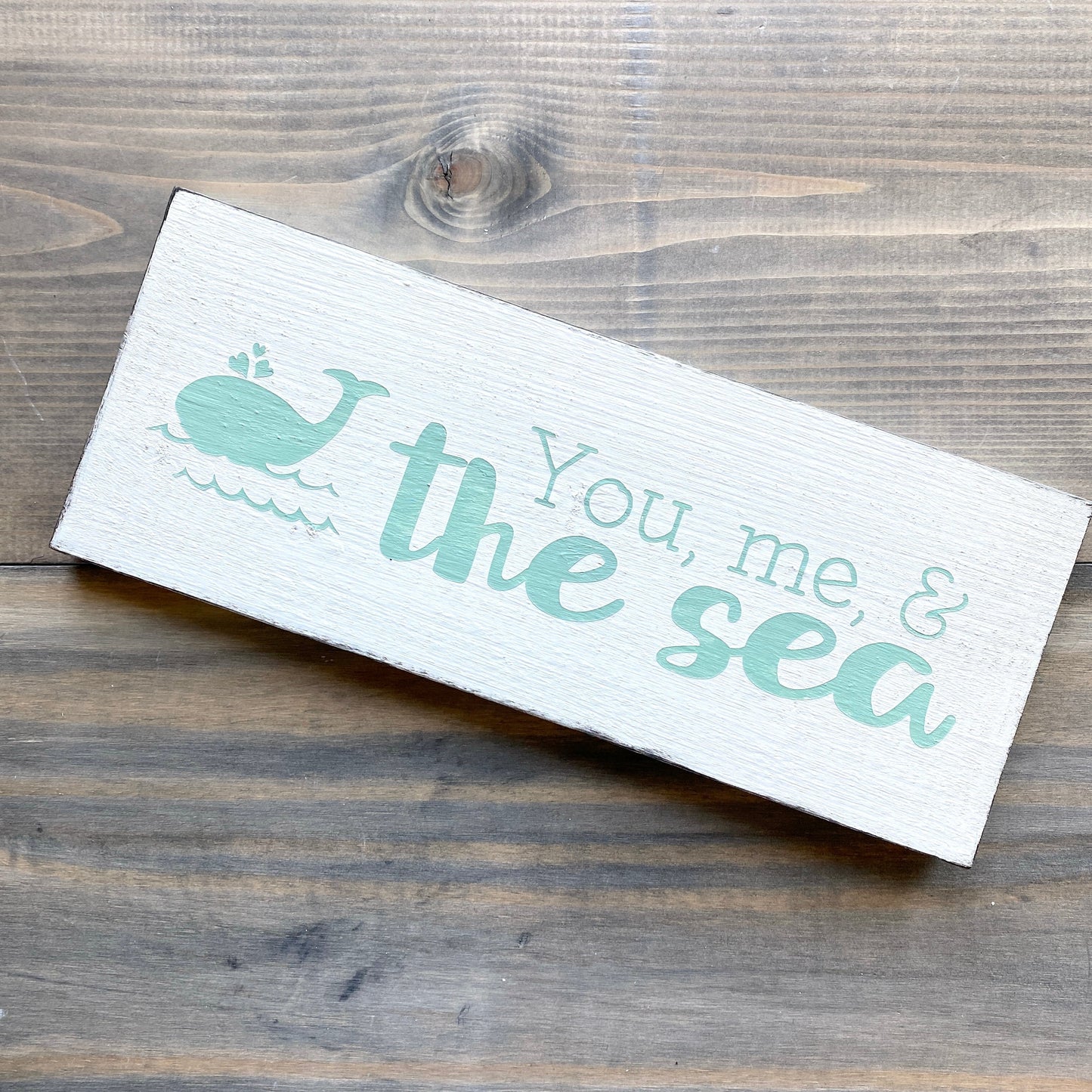 You, me, and the sea sign