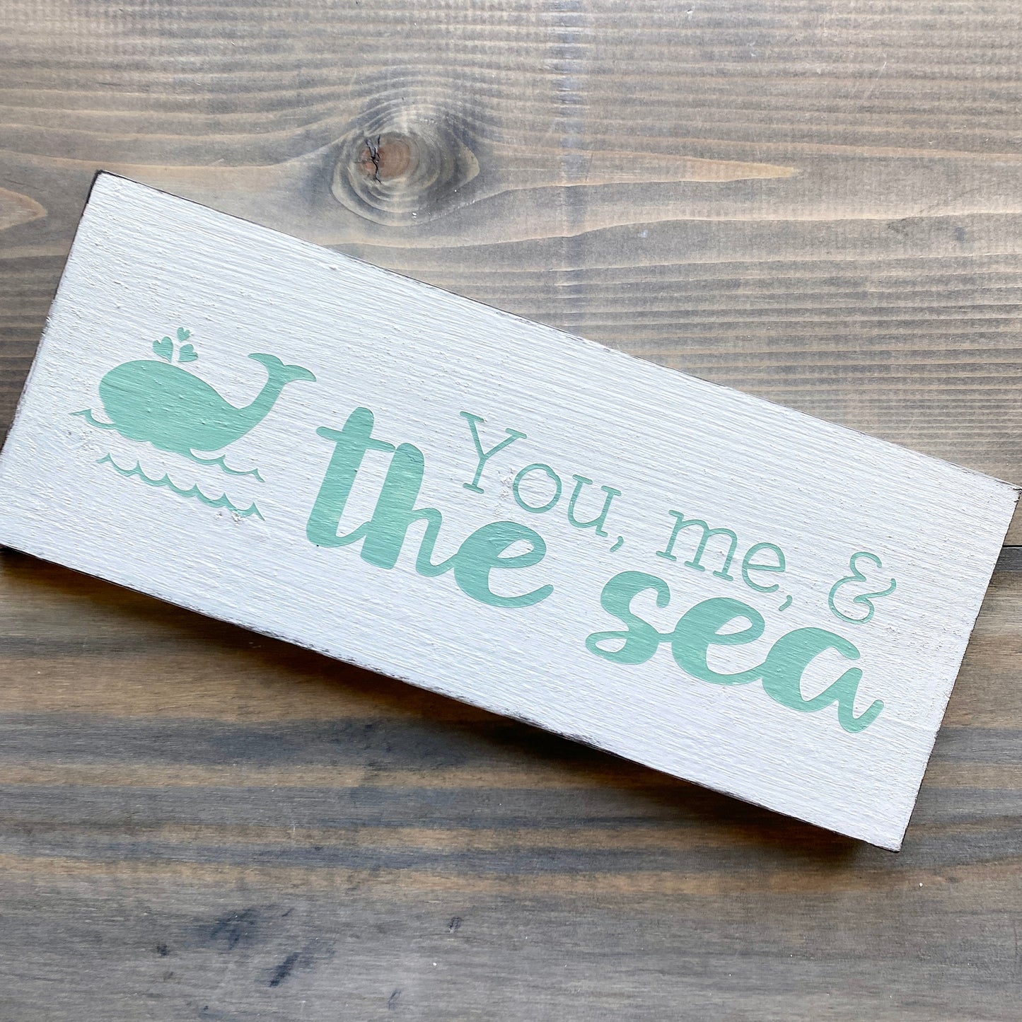 You, me, and the sea sign